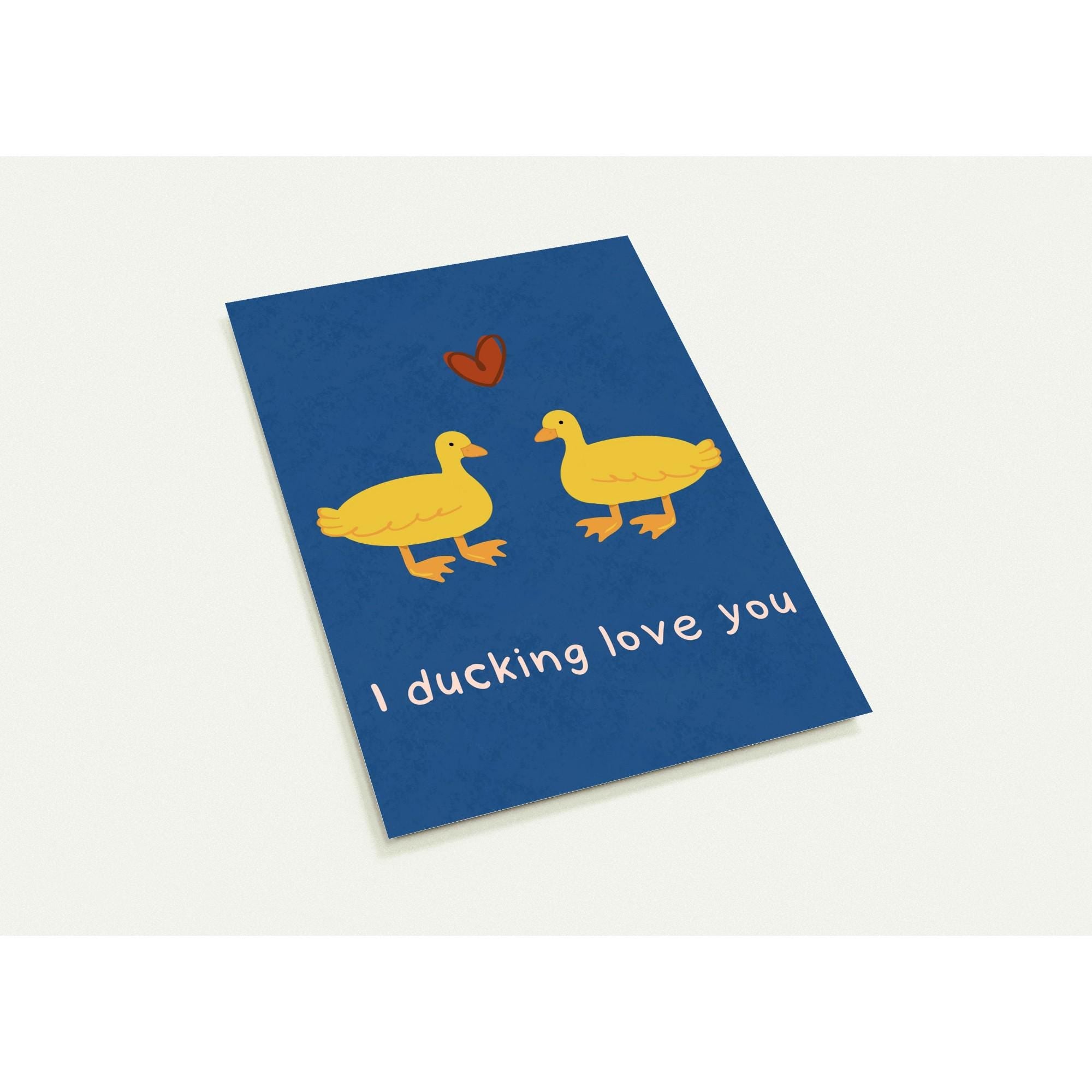 Card with two yellow ducks and a red heart on a blue background with 'I ducking love you' text.