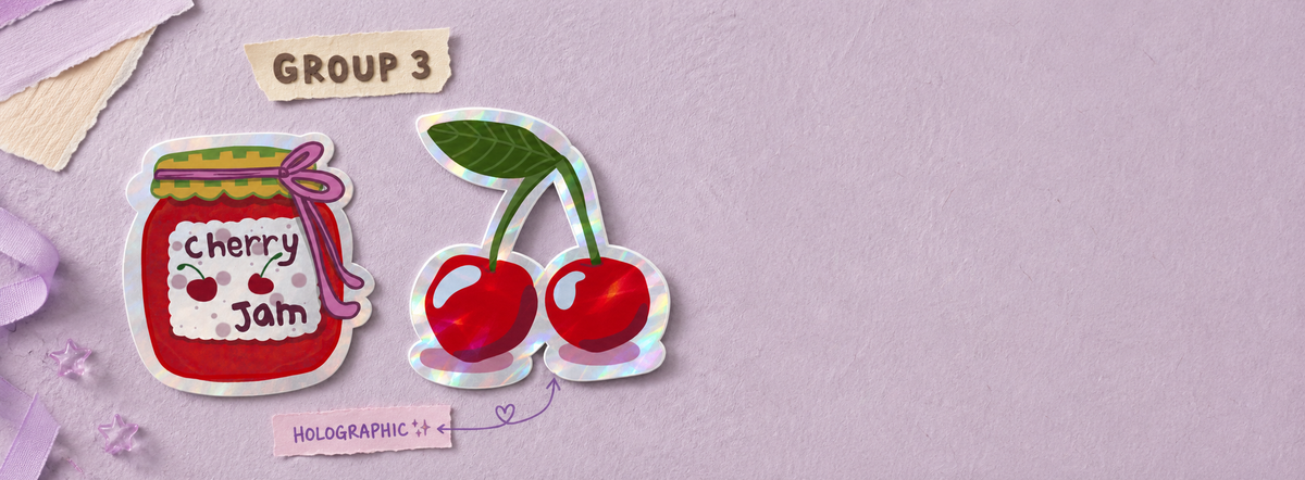 A flat-lay display of two die-cut stickers on a textured lavender background. The sticker on the left is shaped like a jar of cherry jam with a pink ribbon, and the sticker on the right depicts two glossy red cherries with green leaves.