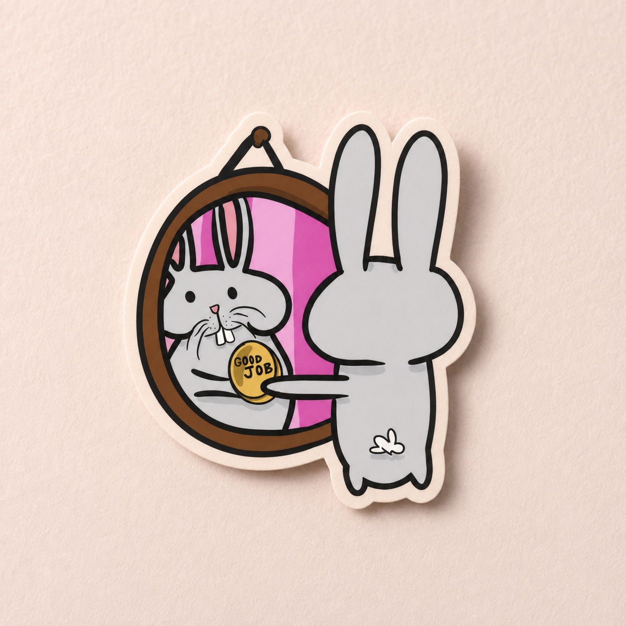 A die-cut sticker featuring a cartoon gray rabbit standing beside an oval mirror. The mirror shows the rabbit eating a gold coin that reads 'GOOD JOB'.